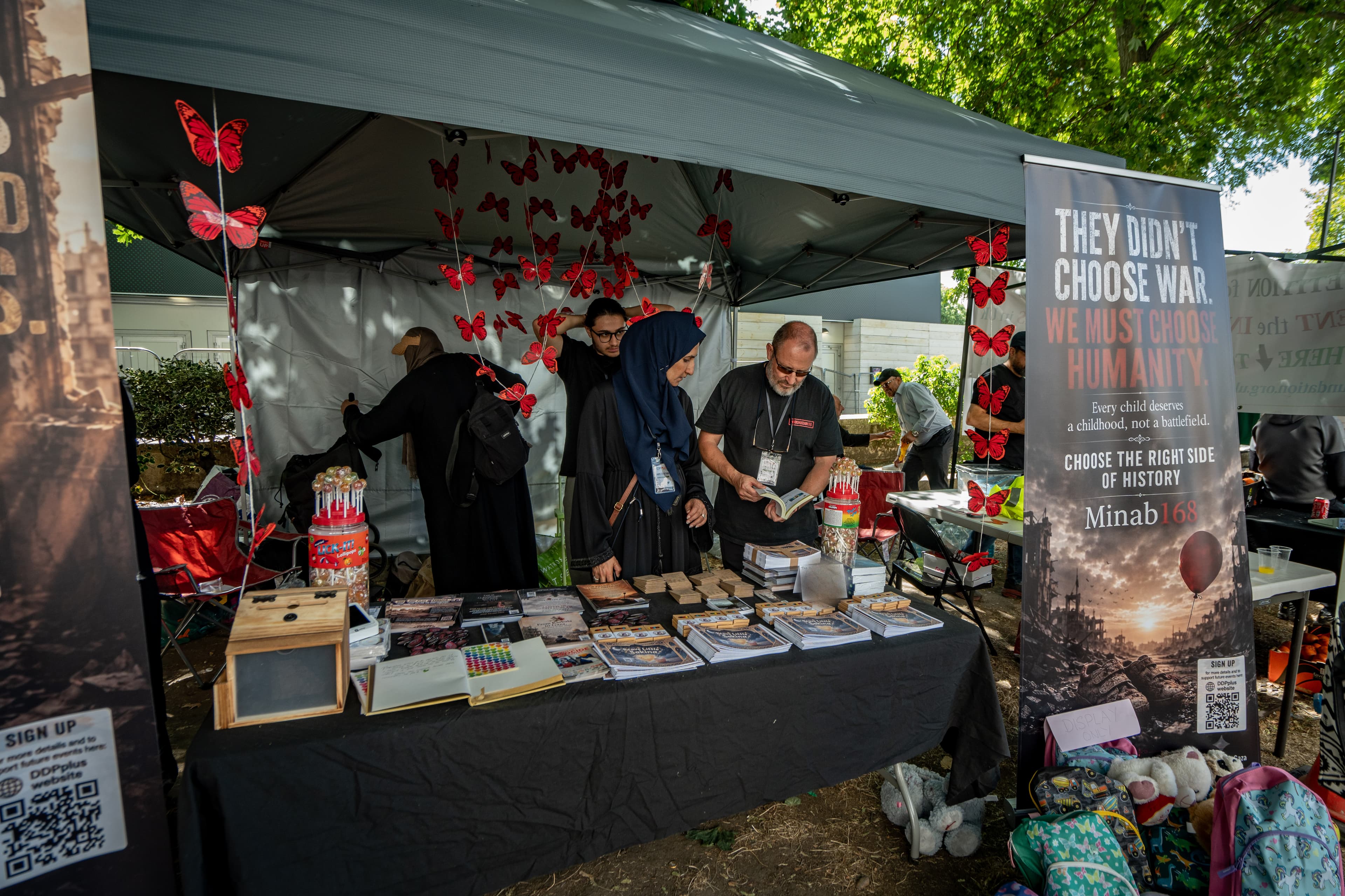 Visitors learning more about the campaign at the stand.