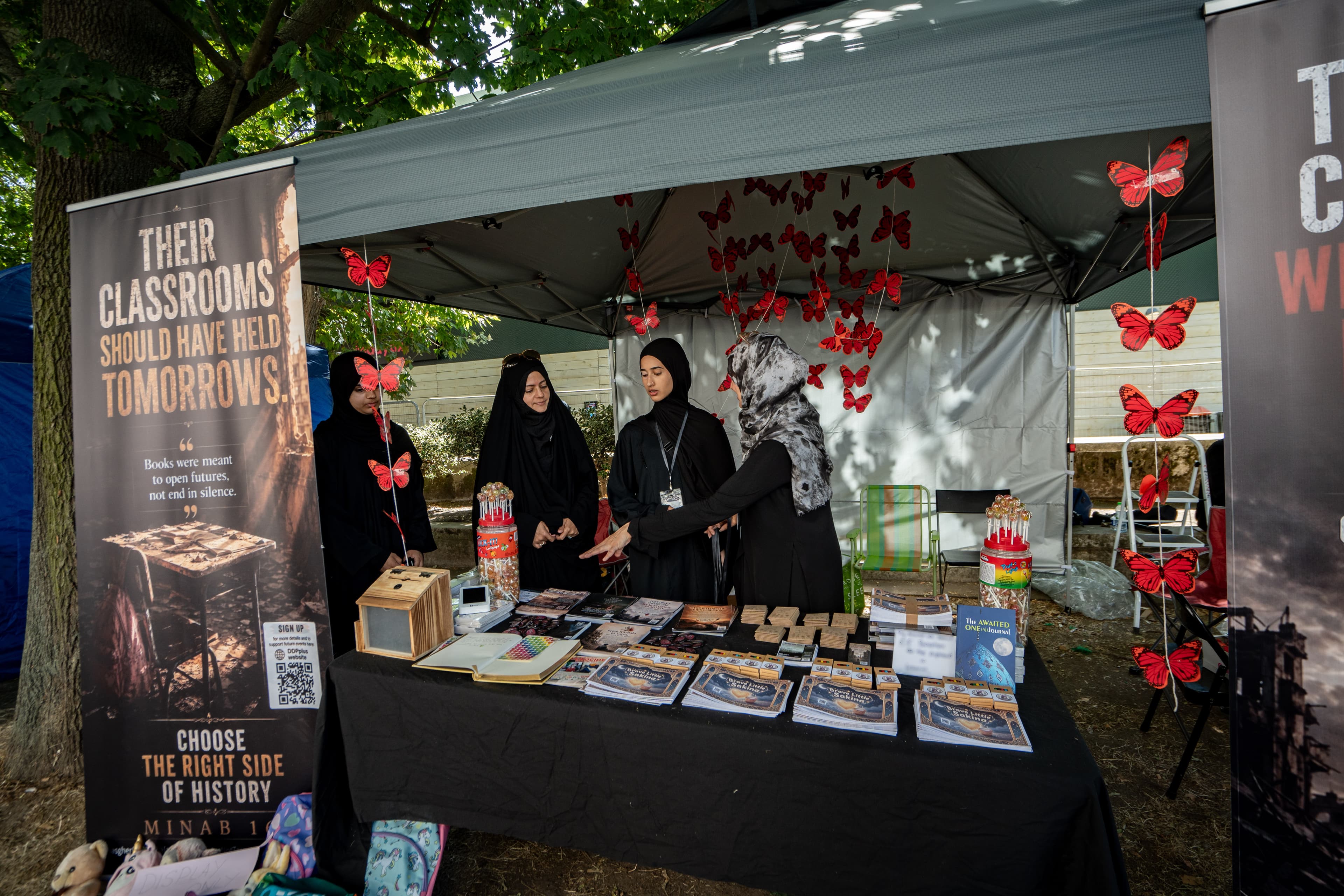 Volunteers sharing campaign information with visitors.