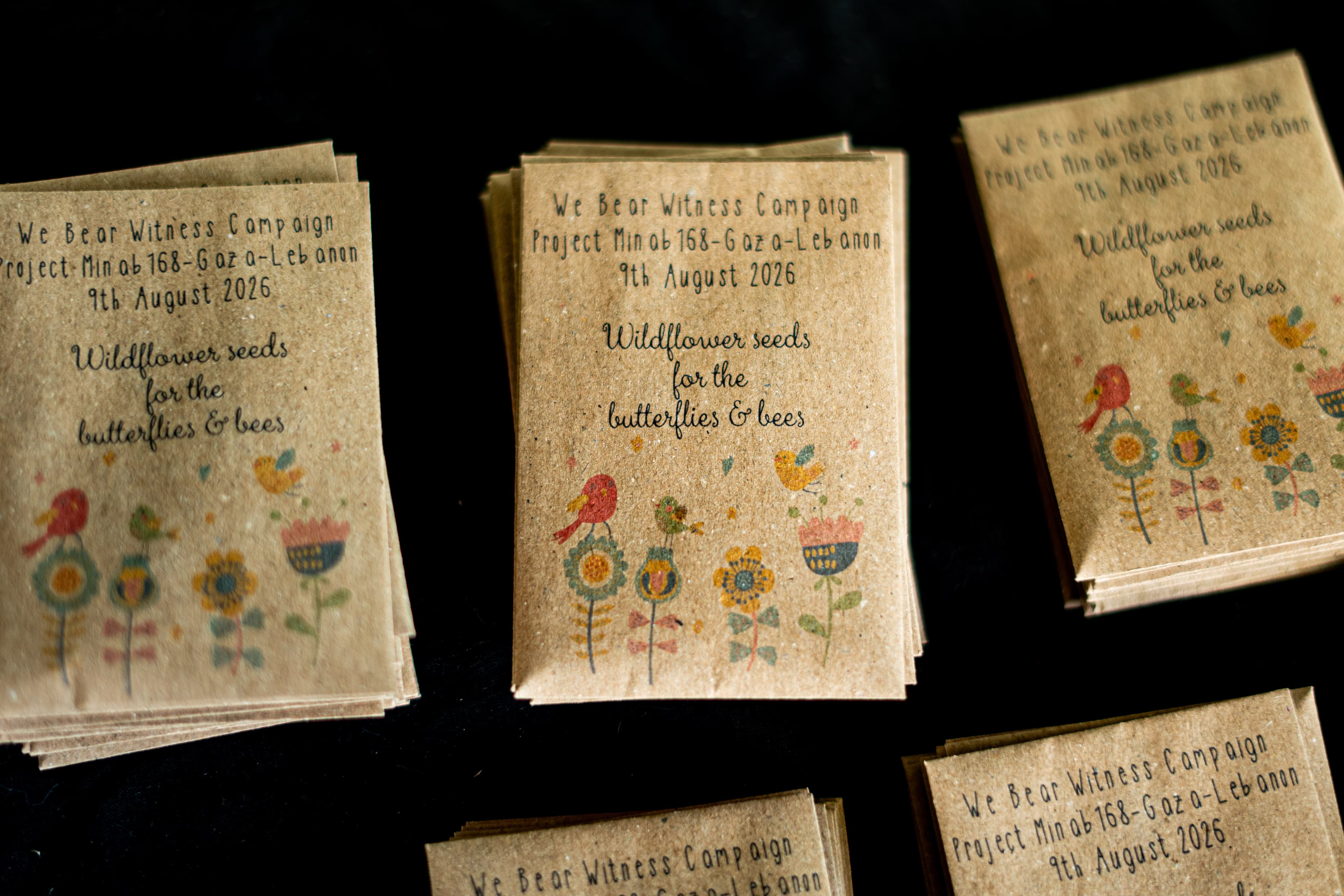 Wildflower seed packets prepared for the We Bear Witness campaign.