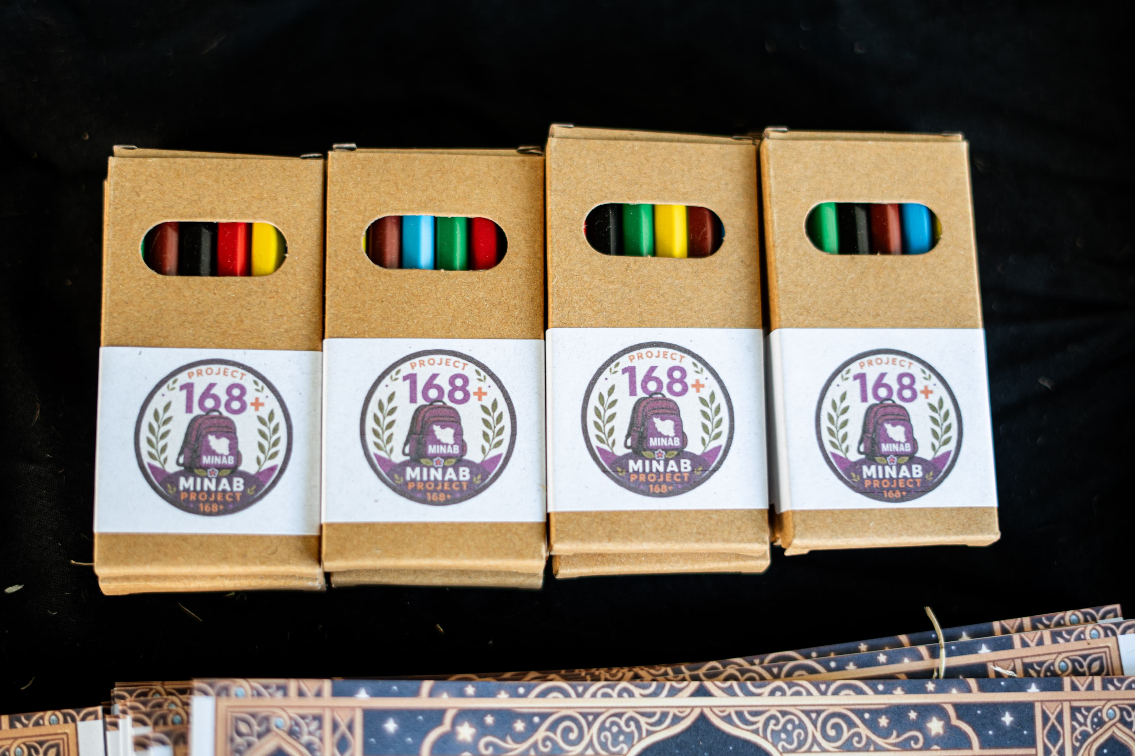 Project 168+ colouring packs displayed at the event.