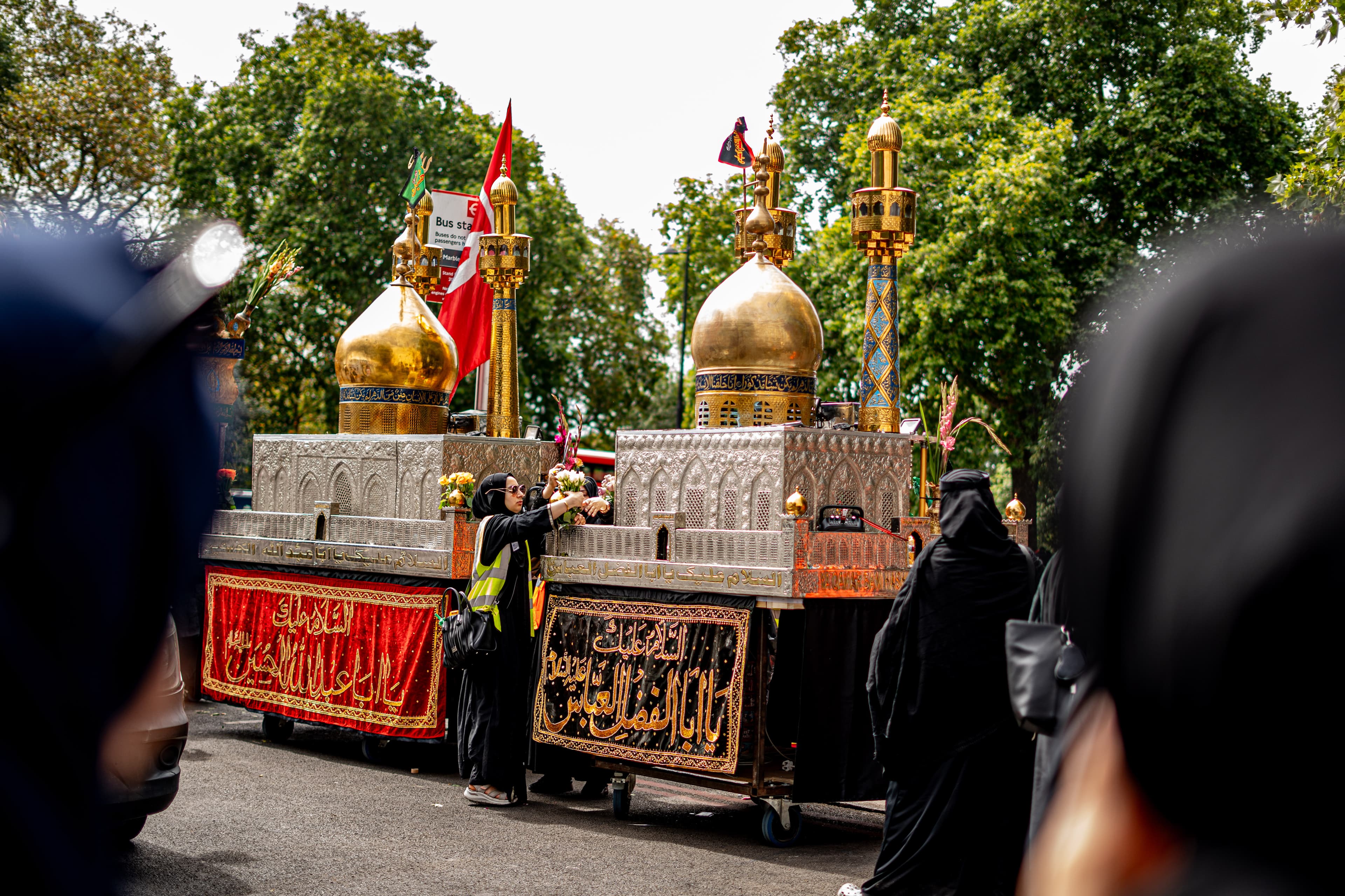 Arbaeen procession symbols carried through London.